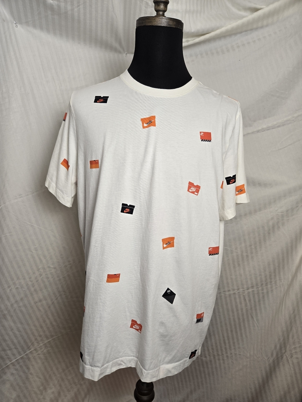 Nike White Short Sleeve Tee with Orange and Black Logo Accents.  TM